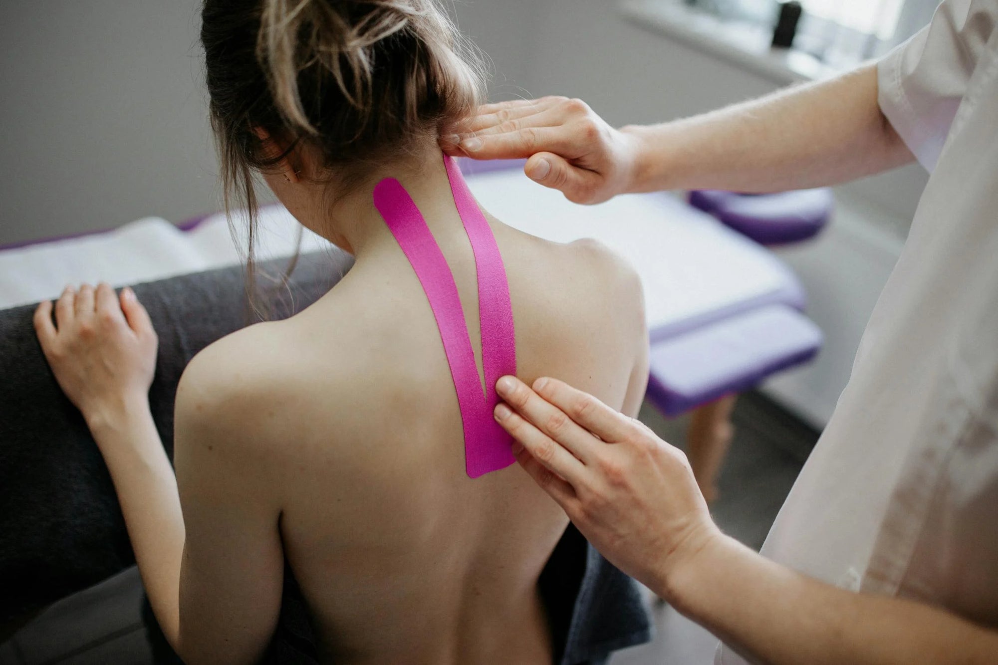 What are the benefits of taping your back?